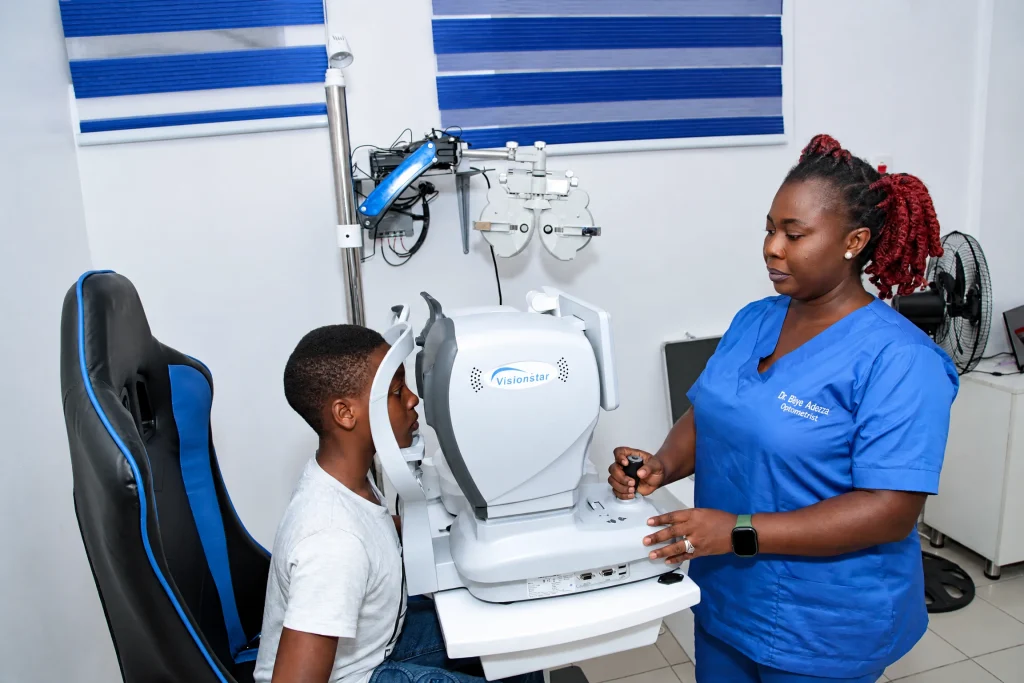 Eye doctor at IrisCare Eye Clinic performing a comprehensive eye examination on a patient using advanced diagnostic equipment to assess vision, detect eye conditions, and provide accurate eye care and treatment recommendations.