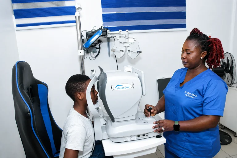 Eye doctor at IrisCare Eye Clinic performing a comprehensive eye examination on a patient using advanced diagnostic equipment to assess vision, detect eye conditions, and provide accurate eye care and treatment recommendations.